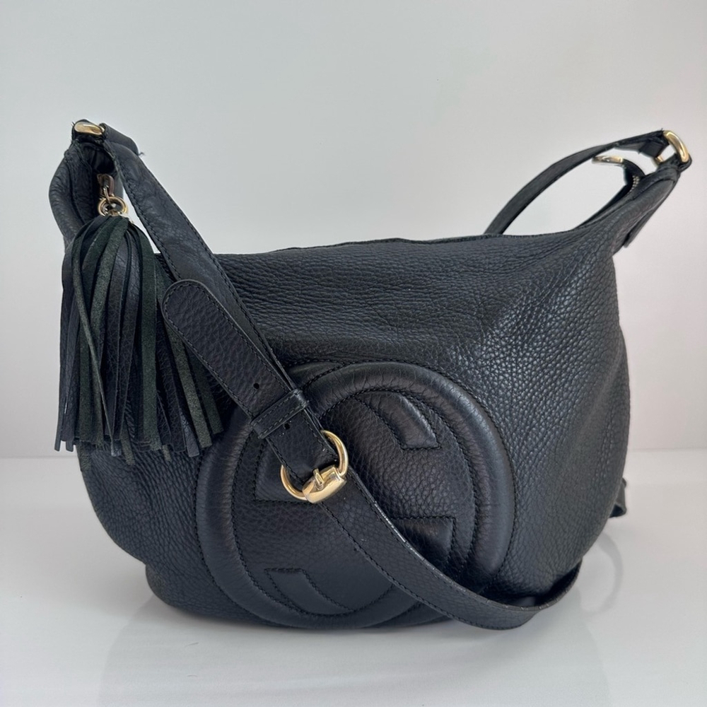 Gucci Black Leather Shoulder Bag with Tassel Accent